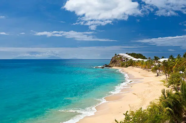 Curtain Bluff Beach and Resort in Antigua. On the horizon the active volcano of Montserrat, just starting a bigger eruption.