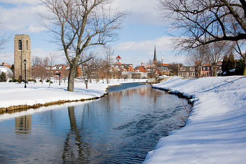 Snow Covered Park and Flowing Stream