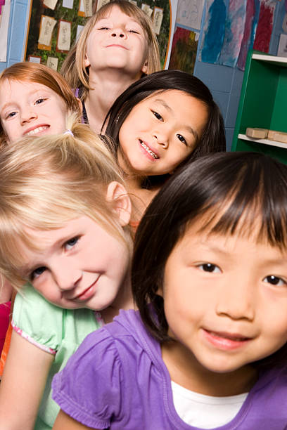 istock Cute little girls in a row 471239733