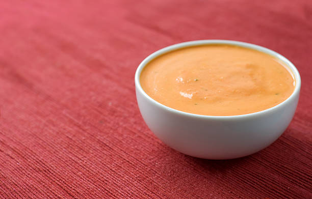 istock Bowl of Tomato Soup on Red 471240411