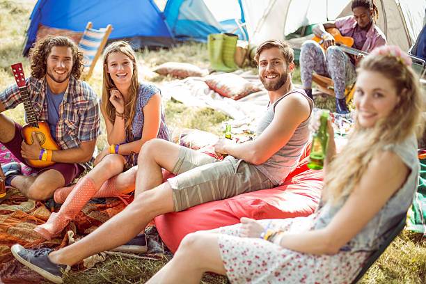 istock Hipsters having fun in their campsite 471242594
