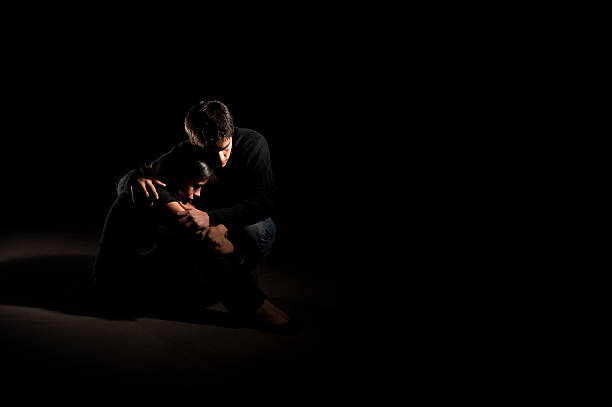 istock Sad couple in a dark room 471242815
