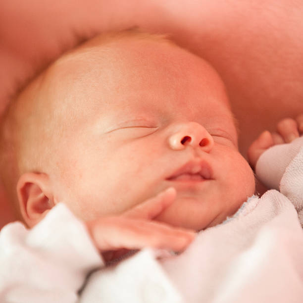 istock 3 weeks old newborn baby sleep 471243655