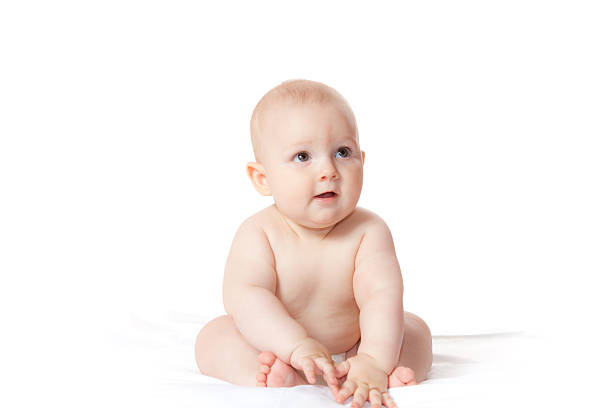 istock Happy Child playing with his feet 471243954