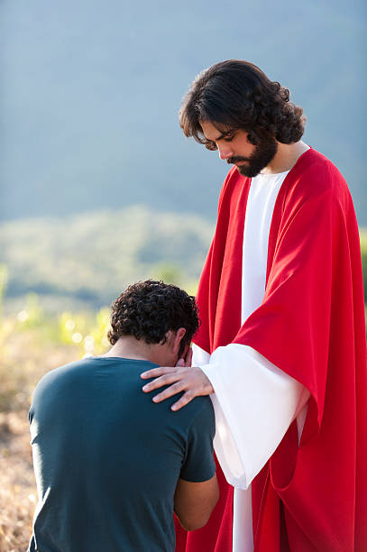 istock Sad man with Jesus by his side 471244133