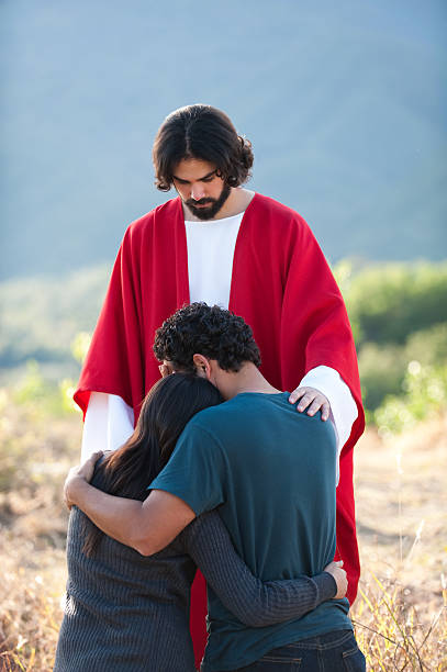 istock Sad couple with Jesus by their side 471244137