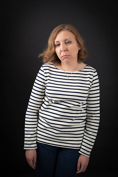 istock Beautiful woman doing different expressions in different sets of clothes 471244180