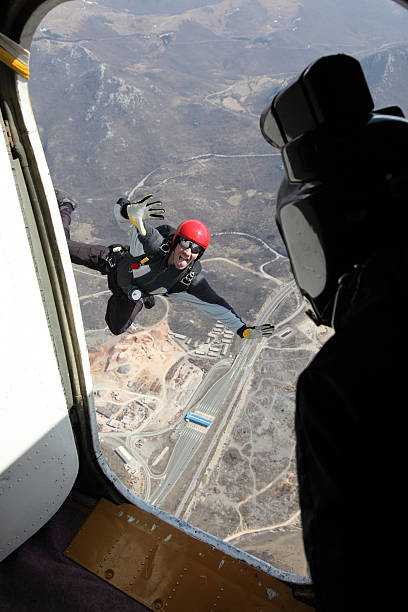 skydiver in aktion - skydiving air aerial view vertical stock-fotos und bilder