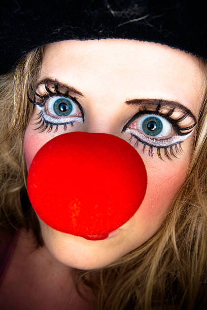 istock Crazy Clown Girl Closeup 471245759