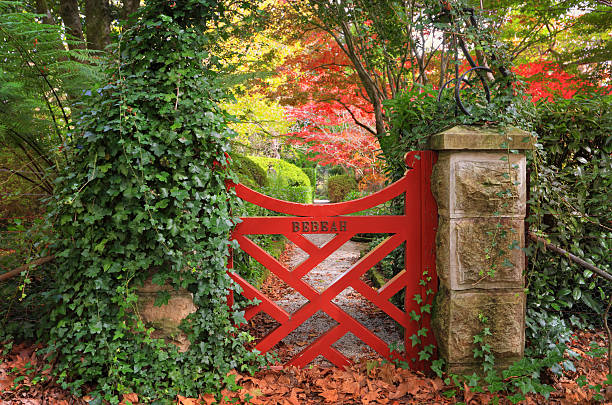 A gated garden arch at the entrance to a formal garden in  Massachusetts.
