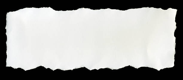 A torn piece of white paper on a black background Ready for your message, isolated. torn paper stock pictures, royalty-free photos & images