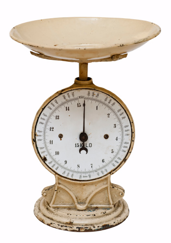 Antique and empty weight scale for domestic use.