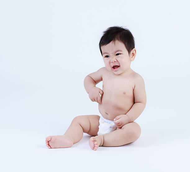 istock Thai baby sitting isolated 471247384