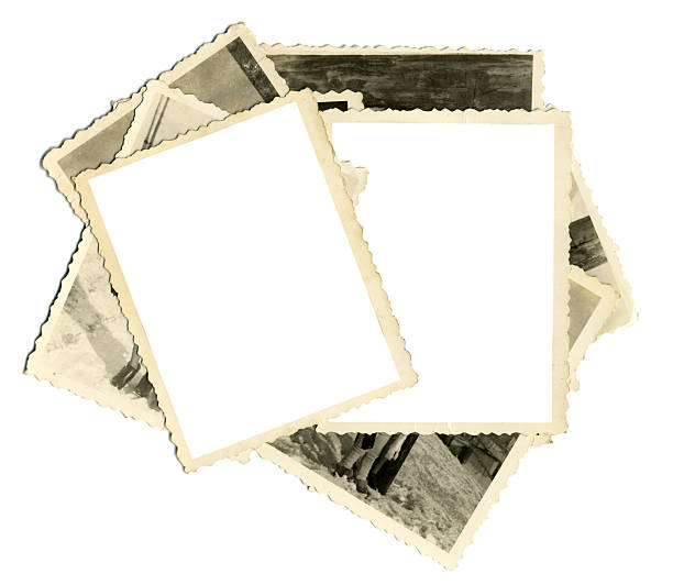 Stack of old photos with two blank on top Isolated old photos. 20th century style photos stock pictures, royalty-free photos & images