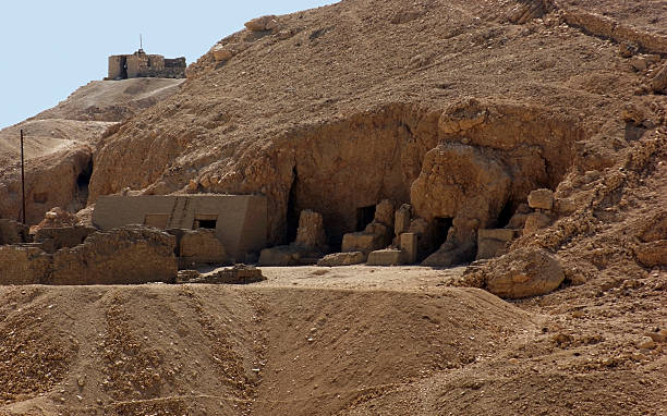 istock rock cut tombs in Egypt 471248753