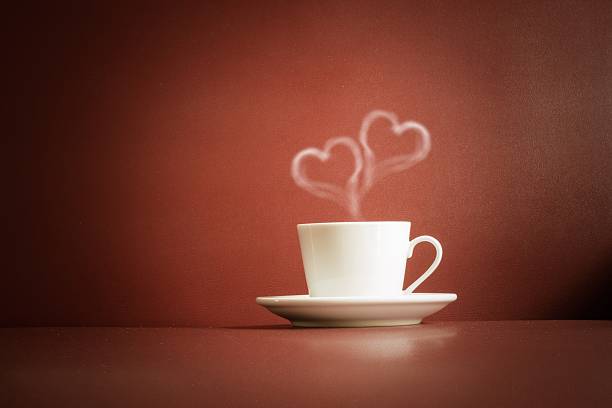 tazza di tè con vapore a forma di cuore due - image created 21st century still life horizontal close up foto e immagini stock