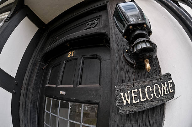 istock Black Door with Welcome sign (Horizontal) 471251879