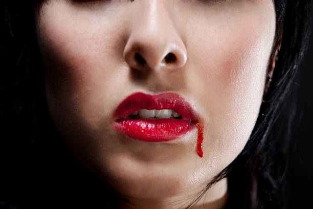 istock Beautiful gothic girl bleeding 471252949