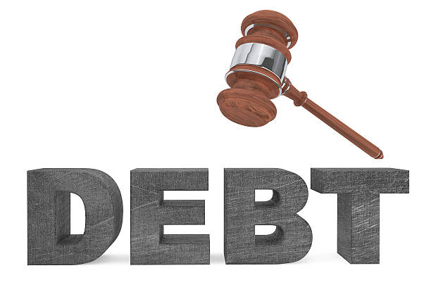 istock Judicial gavel and Debt sign 471253548