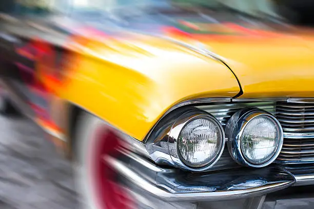 Detail of an American vintage car in motion