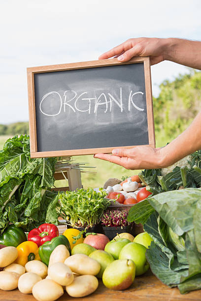 istock Farmer selling his organic produce 471254560