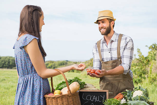 istock Farmer selling his organic produce 471254576