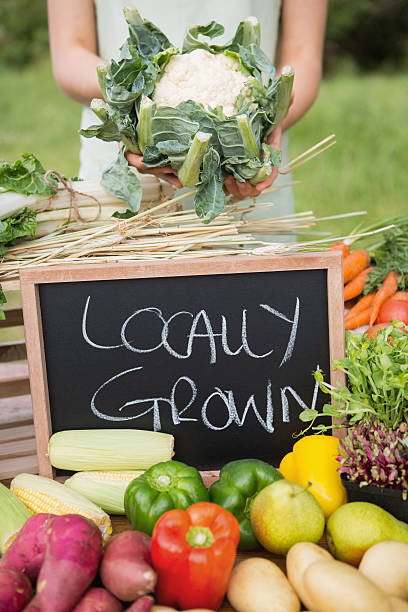 istock Woman selling organic vegetables 471254706