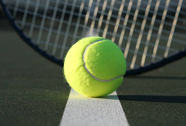 istock Tennis Ball and Racket 471255625