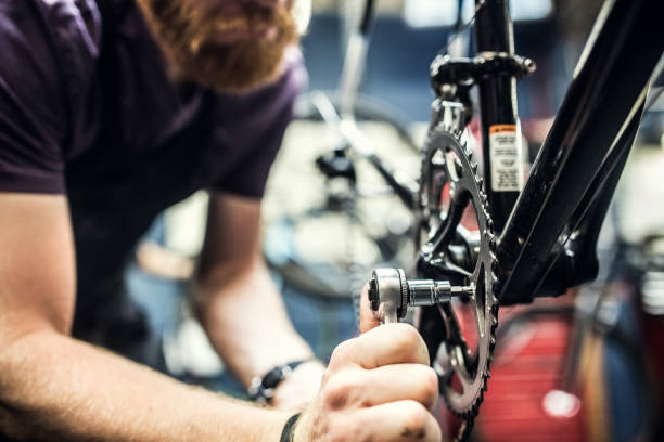 istock Bicycle Repair Shop and Man Working 471258004