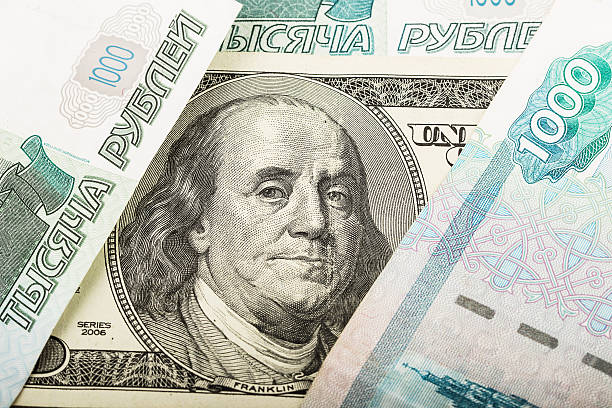 istock Background of Russian and American banknotes 471258500