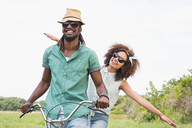 istock Young couple on a bike ride 471258620