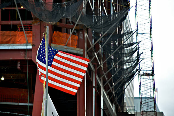 istock American flag at Ground Zero -ONE World Trade Center consturction 471259901