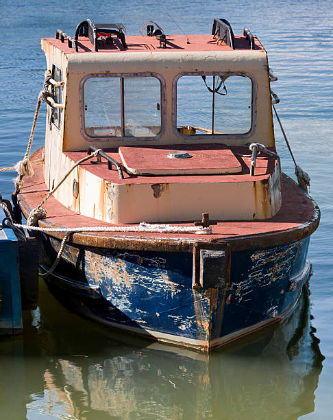 istock Ugly little boat 471261465