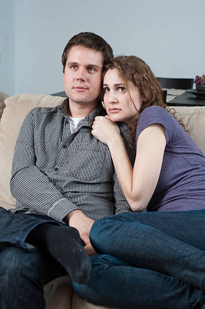 istock Couple watching a scary movie. 471262335