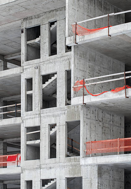 istock Modern building under construction, concrete walls and stairs 471265233
