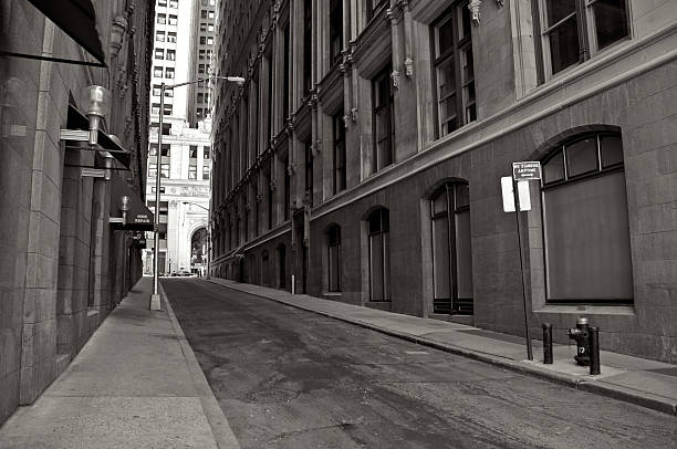 istock NYC  B&W -Narrow, empty street in Financial District 471265431
