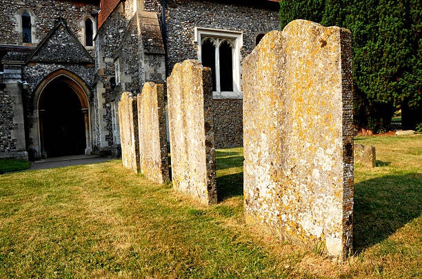 Old english church with grave stones leading up to the entrance.St.Michael's church is located in St.Albans,Hertfordshire,UK.