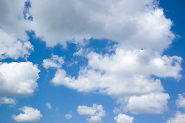 istock looking at the sky with cumulus clouds 471265693