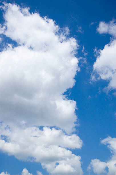 istock looking at the sky with cumulus clouds 471265695