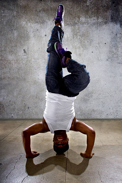 istock Urban Dancer Doing a Headstand or Yoga 471267108