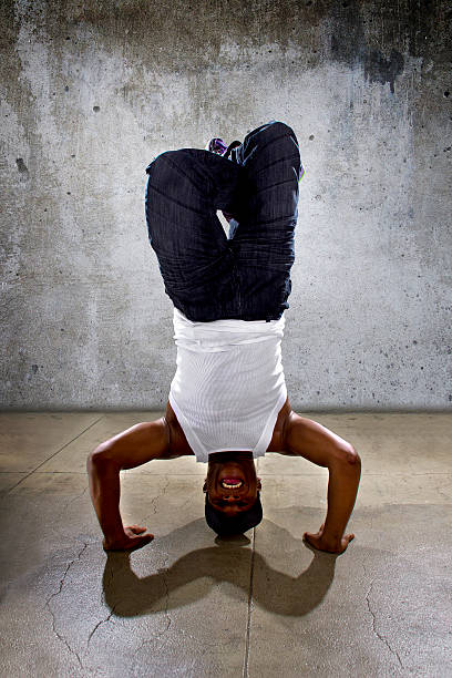 istock Urban Dancer Doing a Headstand or Yoga 471267110