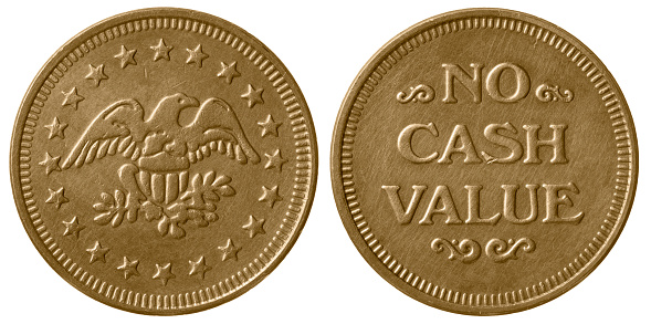 The front and back of a generic game token with an eagle and the phrase \