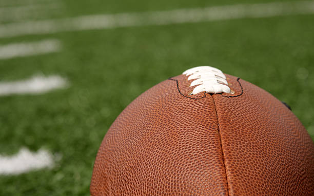 istock Football close up with yard lines 471268633