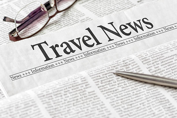 газета с заголовок travel news - travel data newspaper pen стоковые фото и изображения