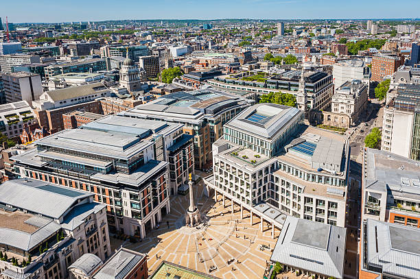 London Paternoster Square London Stock Exchange heart of The City Aerial view over Paternoster Square and the London Stock Exchange in the Square Mile, the City of London's famous financial district, under bright blue summer skies. ProPhoto RGB profile for maximum color fidelity and gamut. paternoster square stock pictures, royalty-free photos & images
