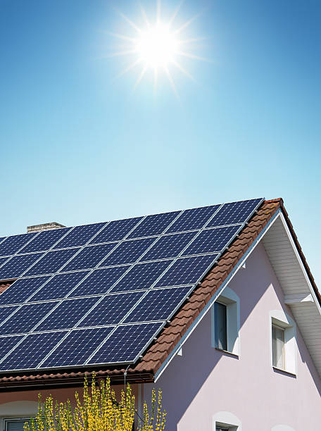 istock House with Solar Panels on the Roof 471275603