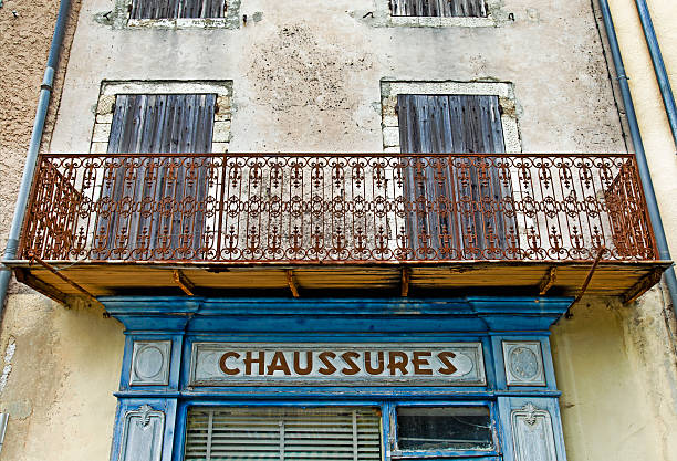 istock Antique shoe store in france 471275657