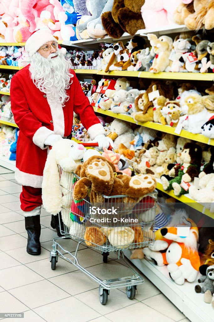 Santa Claus Traditional Santa Claus in toy`s shop Santa Claus Stock Photo