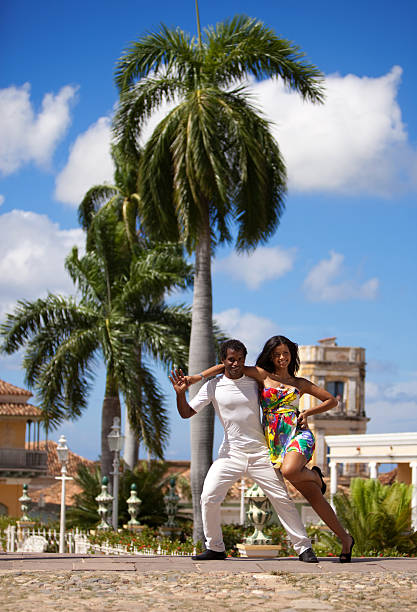 istock Young black couple dancing salsa 471277437