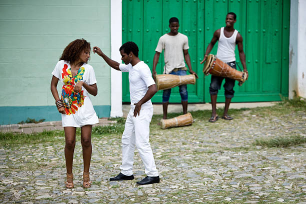 istock Young black couple dancing salsa 471277441